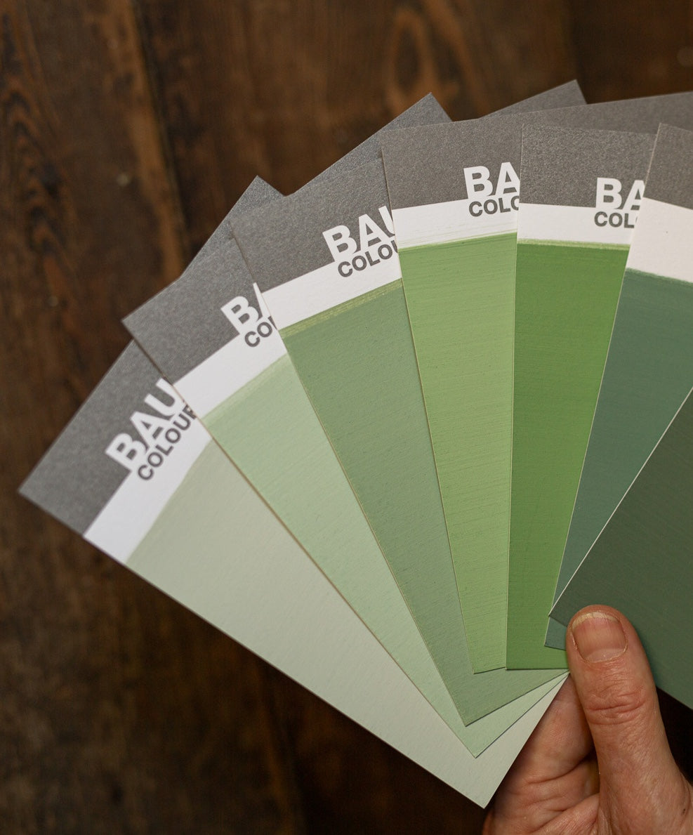 handprinted colour cards as part of a boxed set of green limewash swatch set for close shade colour selection | © Bauwerk Colour