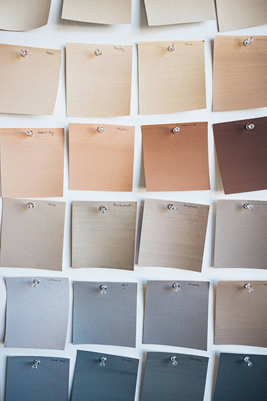 hand painted lime wash swatches for selecting shades of colour sorted from light to dark moody shades | © Bauwerk Colour